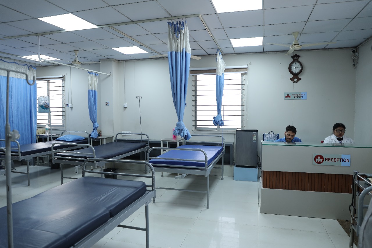Patient room with modern amenities at RK Hospital